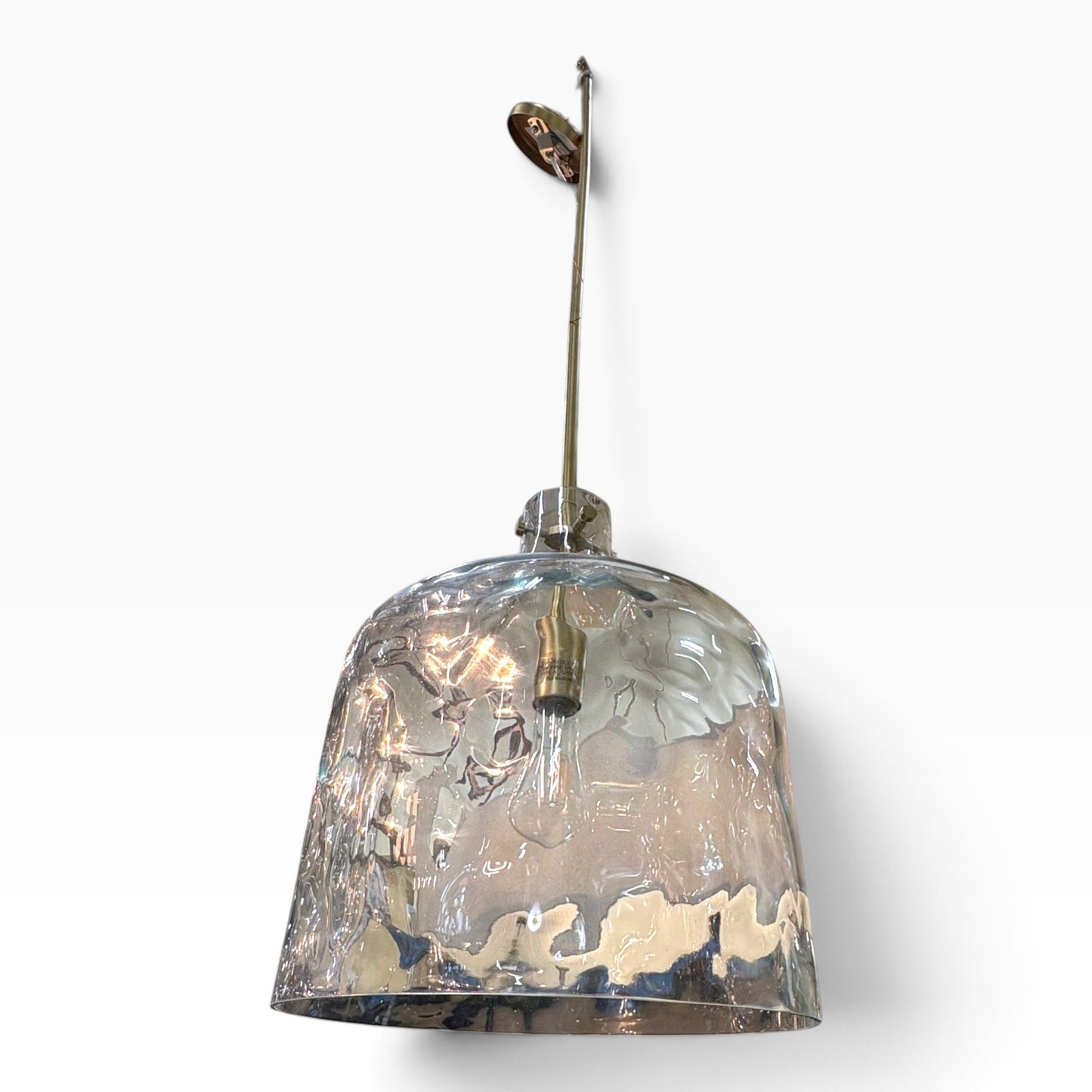 GDM Habitat for Humanity ReStore pendant light featuring a large, clear, rippled glass dome shade with brass hardware.