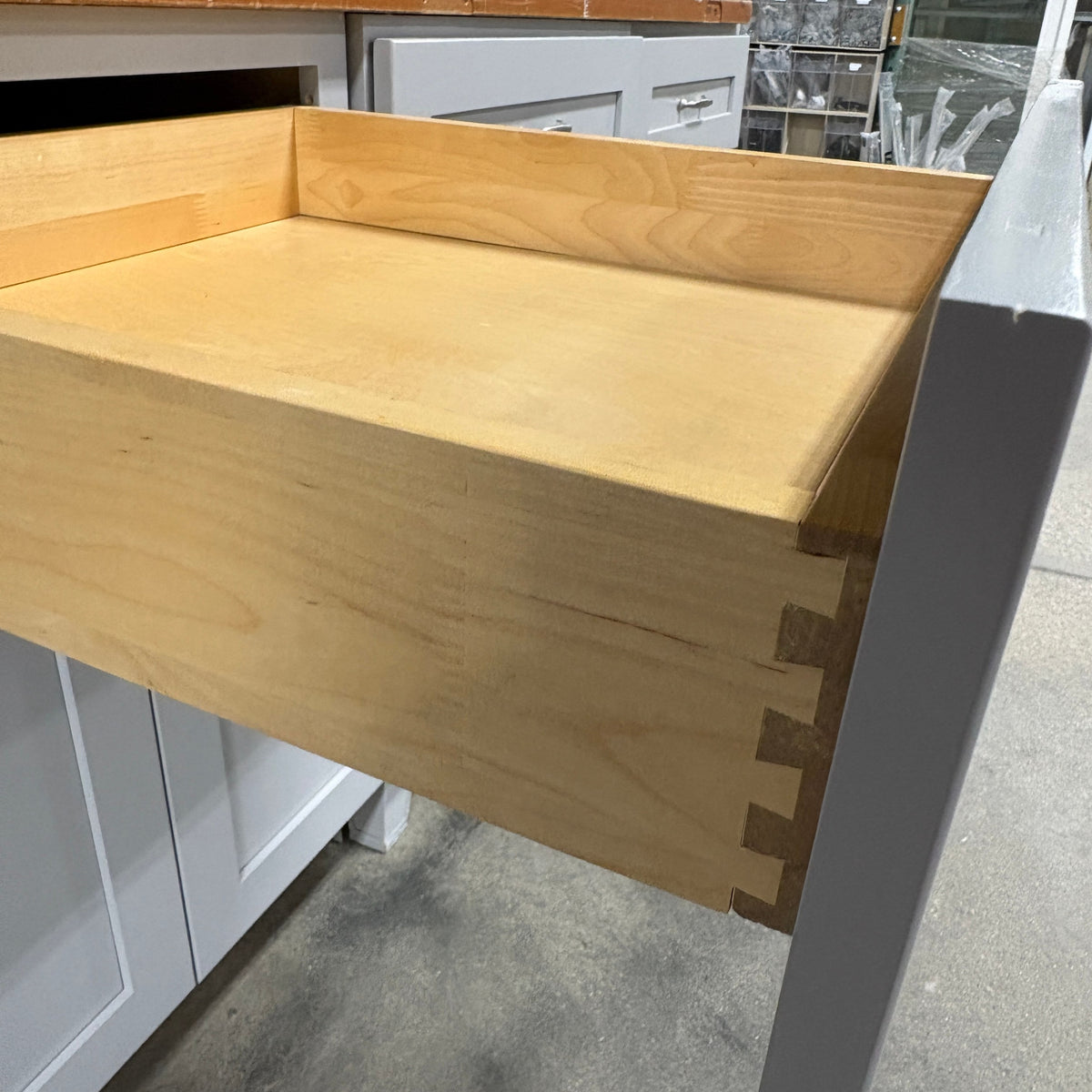GDM Habitat for Humanity ReStore gray cabinet drawer with exposed dovetail joinery and natural wood interior