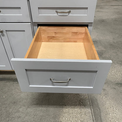 GDM Habitat for Humanity ReStore gray kitchen cabinet with an open wooden drawer and silver metal handle