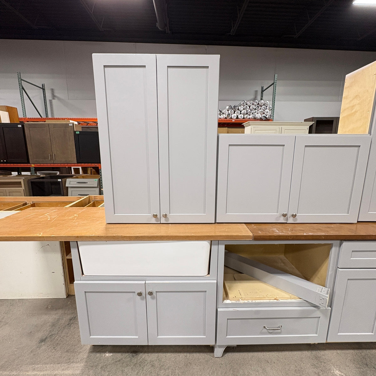 GDM Habitat for Humanity ReStore 15-piece gray shaker-style kitchen cabinet set with a white farmhouse sink
