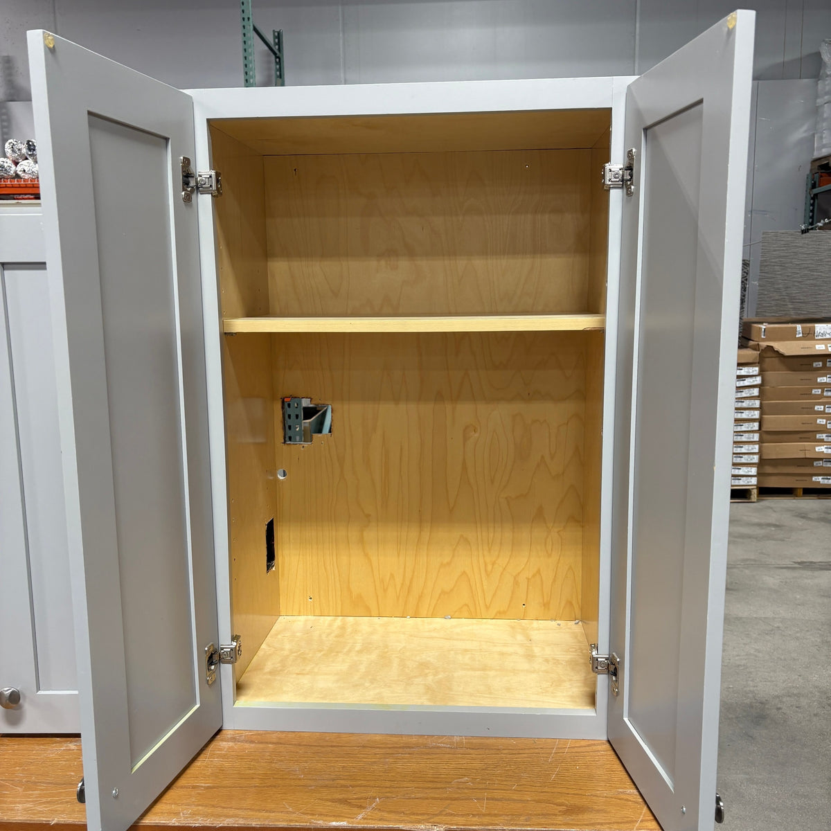 GDM Habitat for Humanity ReStore gray shaker style wall cabinet with open doors and natural wood interior shelving
