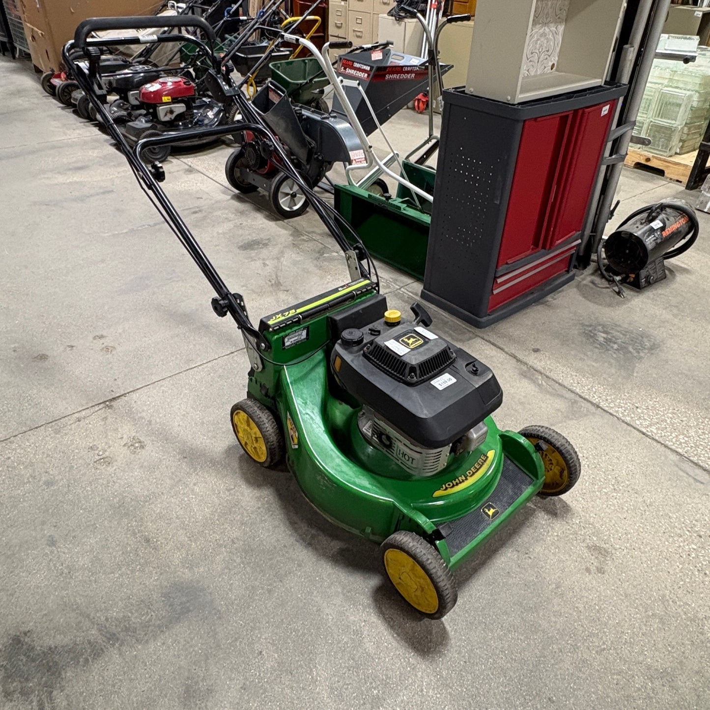 GDM Habitat for Humanity ReStore John Deere JX75 walk-behind gas lawn mower in iconic green and yellow finish