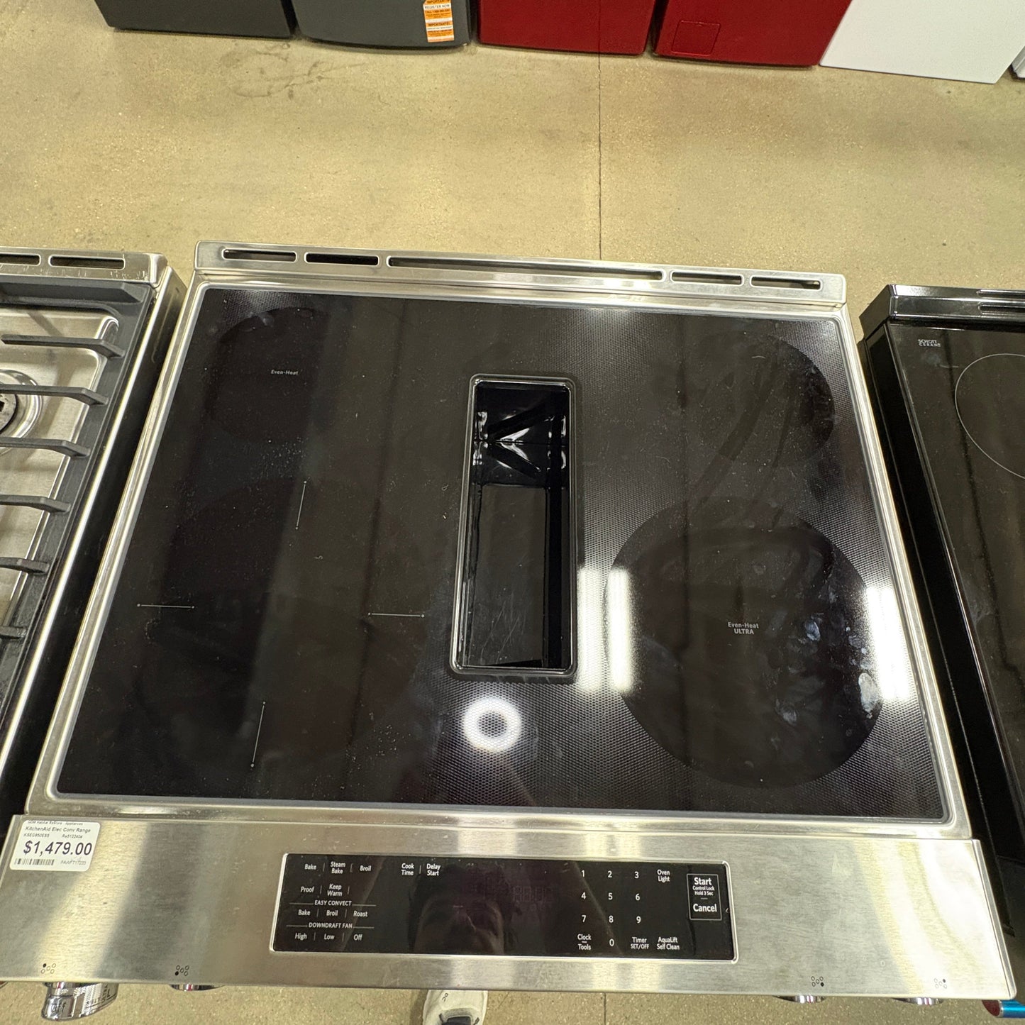 GDM Habitat for Humanity ReStore KitchenAid electric slide-in range with glass cooktop and integrated downdraft vent.