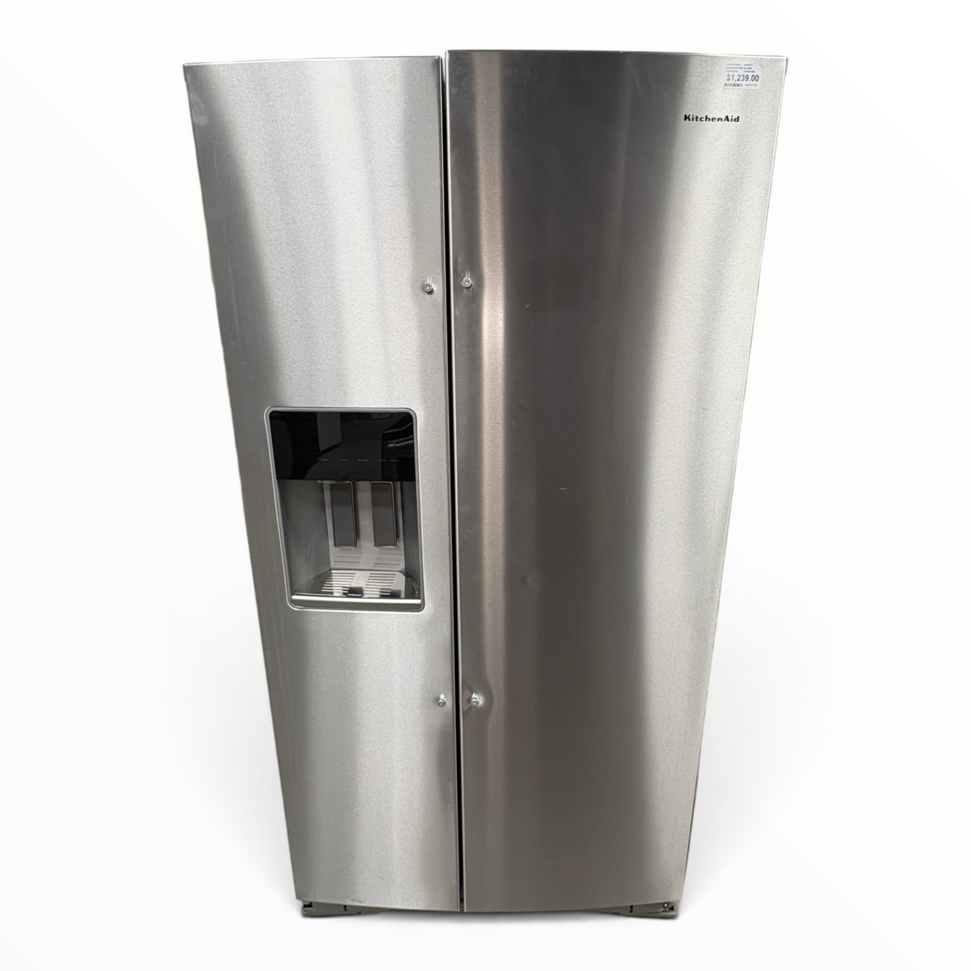 GDM Habitat for Humanity ReStore KitchenAid side-by-side stainless steel refrigerator with water and ice dispenser.