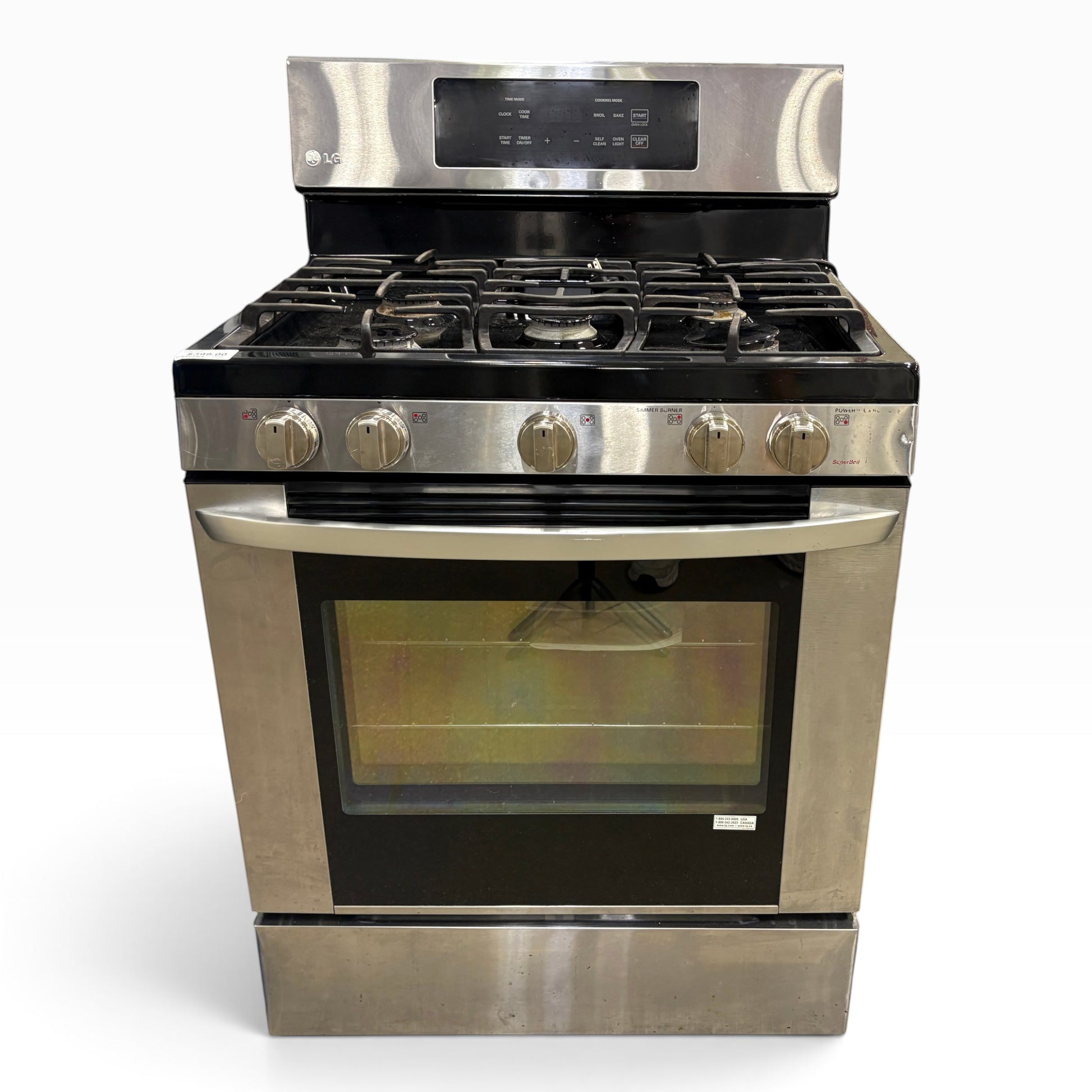 GDM Habitat for Humanity ReStore stainless steel LG gas range with five burners and a glass oven door