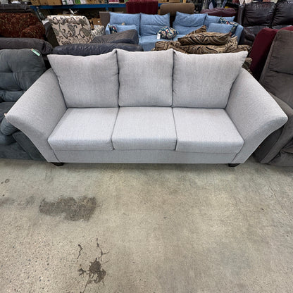 GDM Habitat for Humanity ReStore light gray three-seater sofa with flared arms and plush back cushions