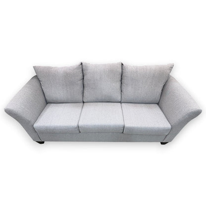 GDM Habitat for Humanity ReStore light gray three-seater sofa with flared arms and plush back cushions