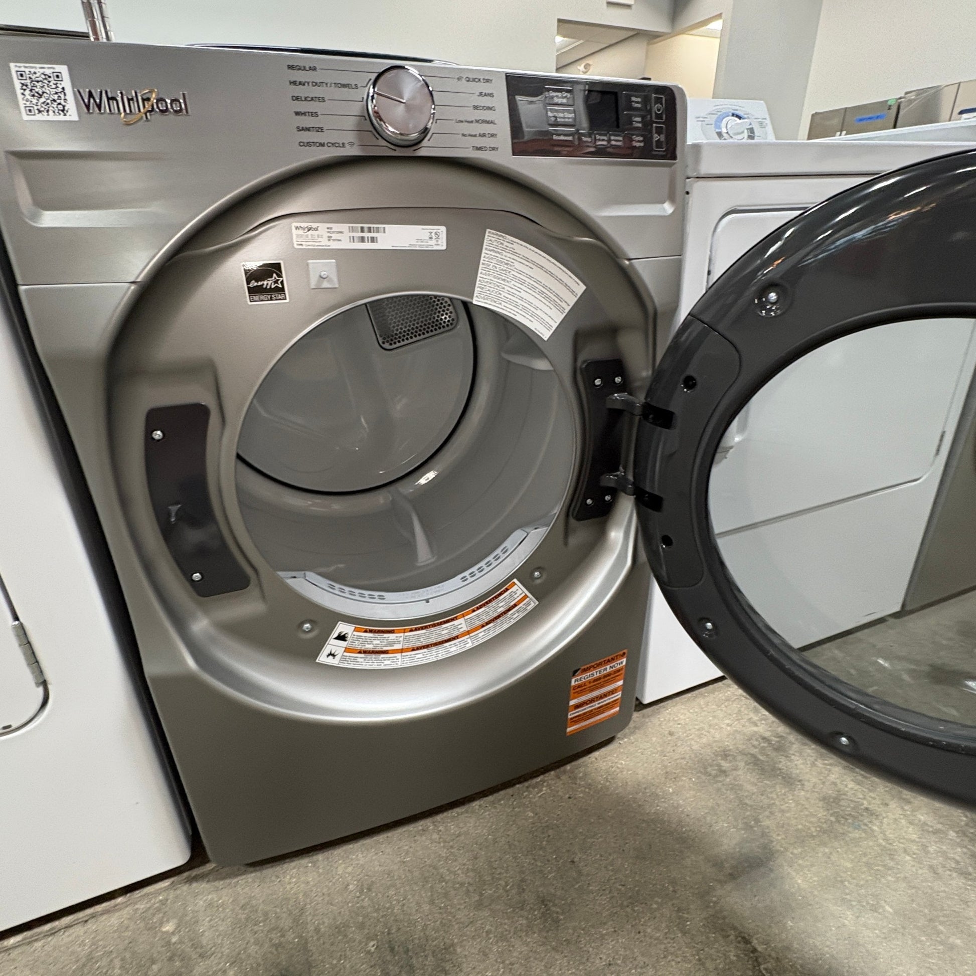GDM Habitat for Humanity ReStore metallic Whirlpool electric dryer with open door and intuitive control panel