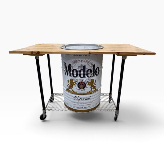 GDM Habitat for Humanity ReStore Modelo barrel bar table with a wooden top, metal wire shelf, and rolling casters.