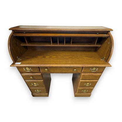 GDM Habitat for Humanity ReStore oak roll-top desk with multiple drawers and brass hardware in a classic wood finish