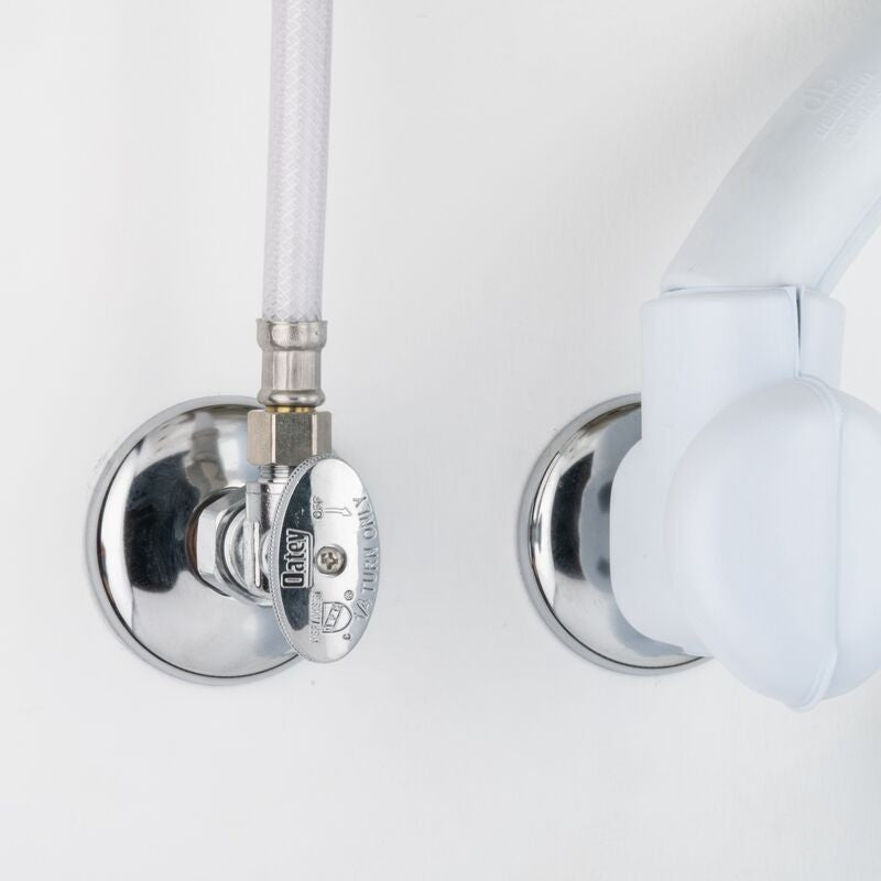 GDM Habitat for Humanity ReStore Oatey angled stop valve with chrome finish and white supply line on wall