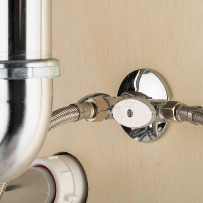 GDM Habitat for Humanity ReStore Oatey chrome straight stop valve installed on a light wood cabinet wall