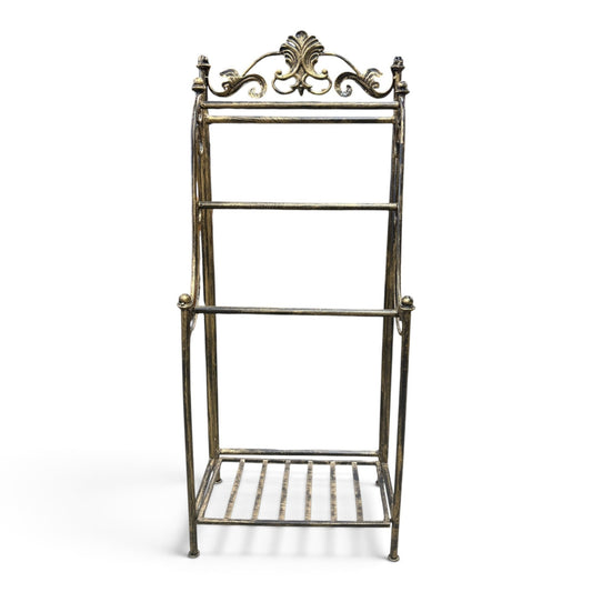 GDM Habitat for Humanity ReStore ornate metal quilt rack with a distressed gold finish and decorative scrollwork top.