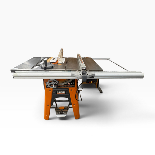 GDM Habitat for Humanity ReStore RIDGID TS3650 table saw with orange metal base and adjustable fence