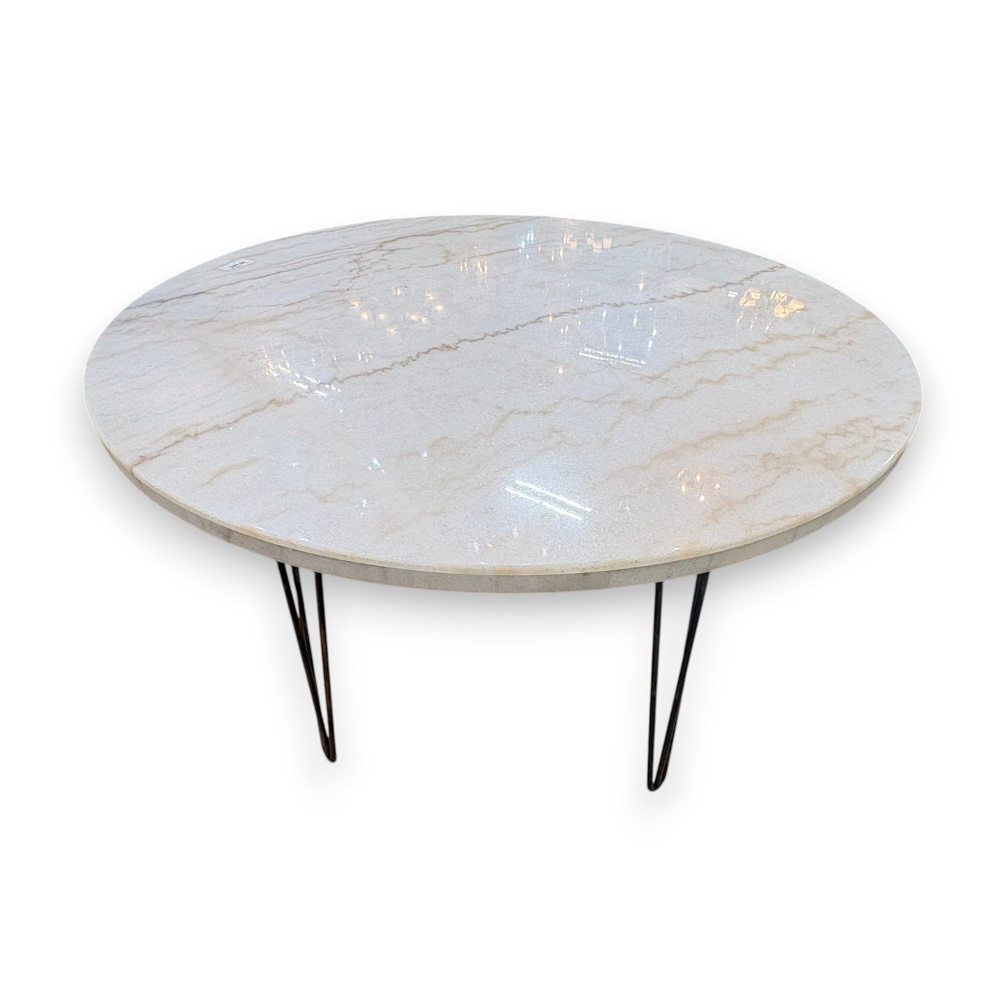 GDM Habitat for Humanity ReStore round table with a cream marble-look top and black metal hairpin legs