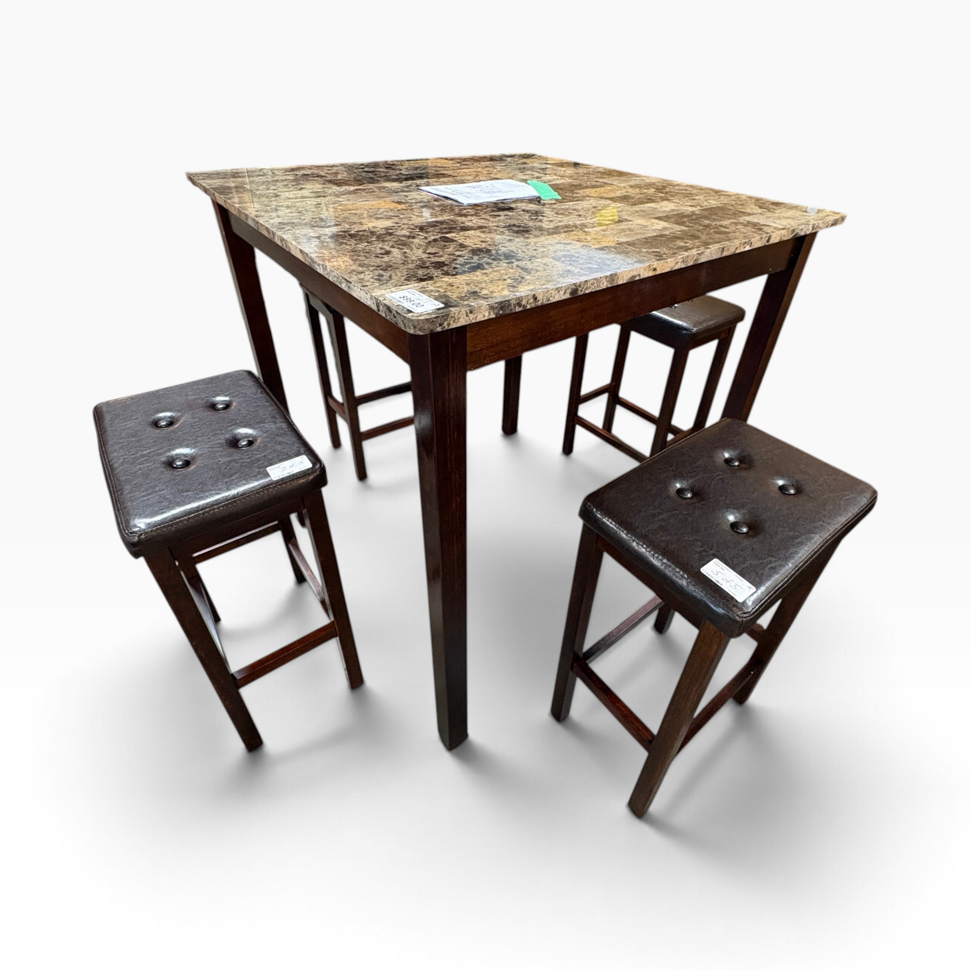 GDM Habitat for Humanity ReStore square dining table with faux marble top and four button-tufted dark brown stools.