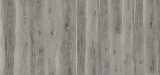 GDM Habitat for Humanity ReStore Titanium vinyl plank flooring with a weathered grey wood grain texture