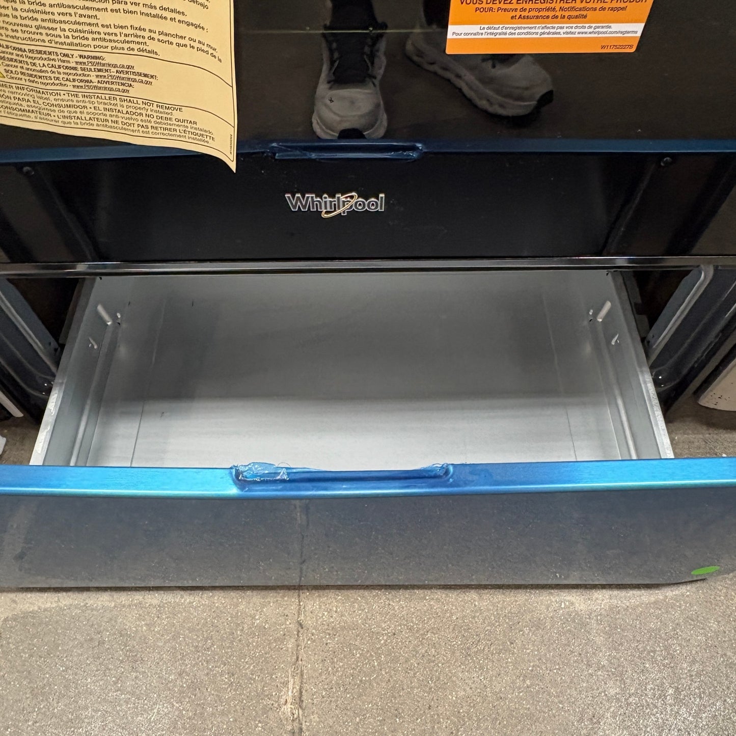 GDM Habitat for Humanity ReStore Whirlpool electric range featuring a sleek black finish and an open storage drawer