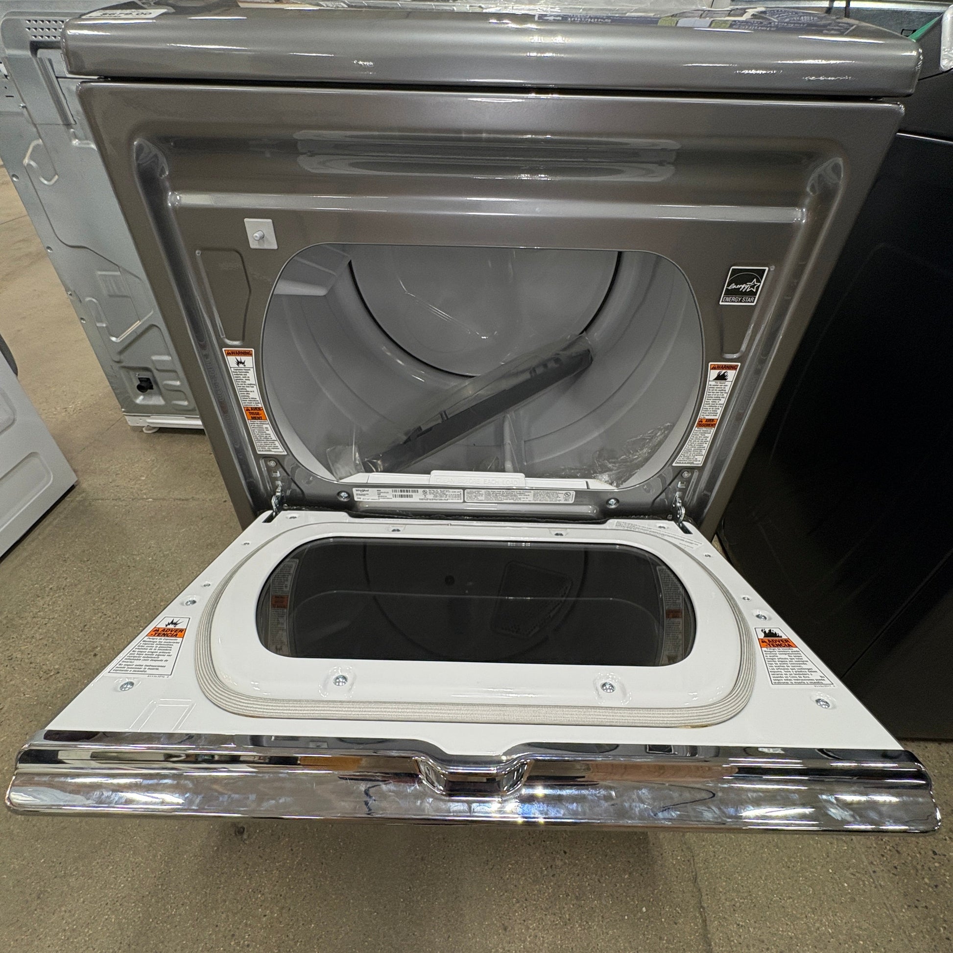 GDM Habitat for Humanity ReStore Whirlpool gas dryer with open door showing the interior drum and glass window