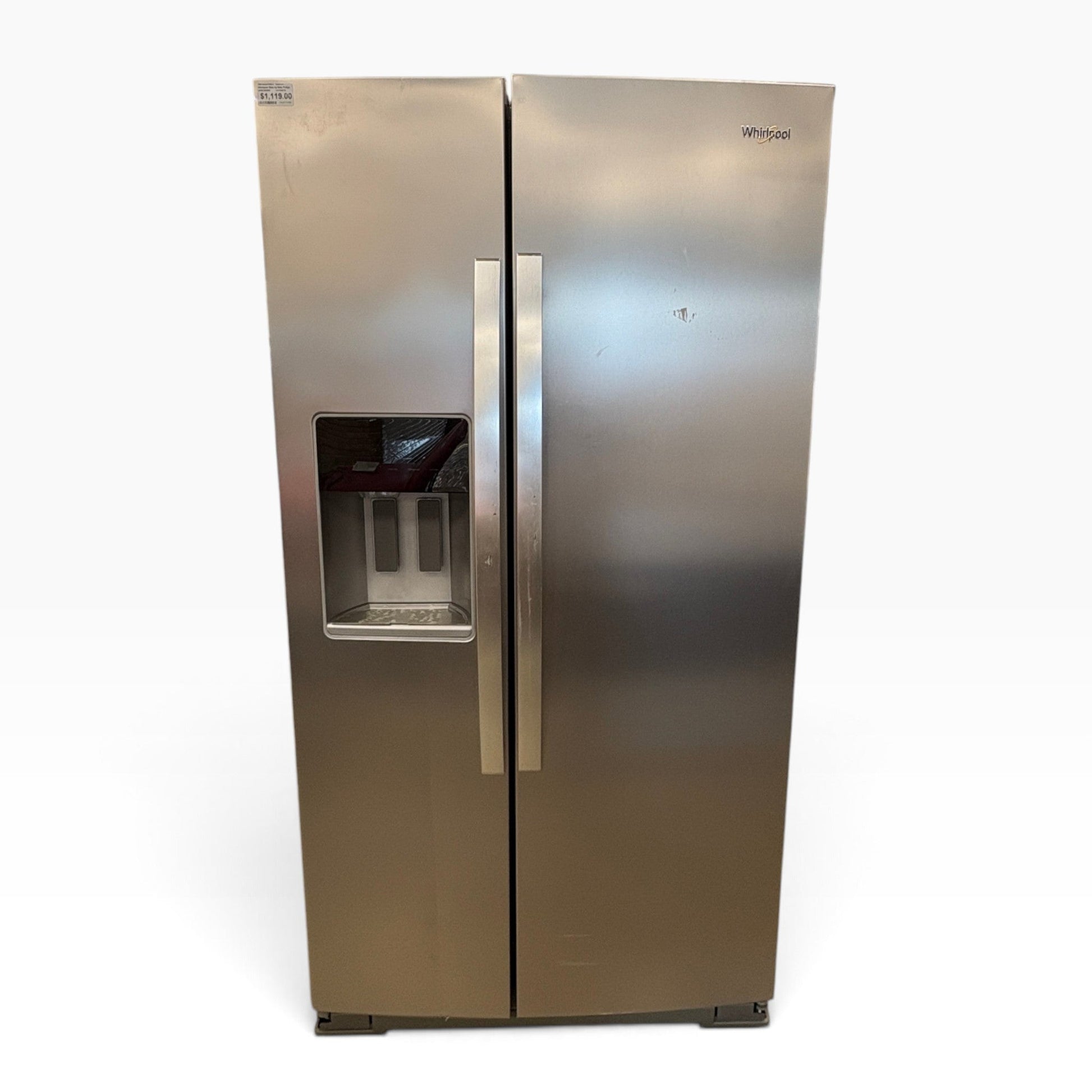 GDM Habitat for Humanity ReStore Whirlpool side-by-side refrigerator in stainless steel with water dispenser