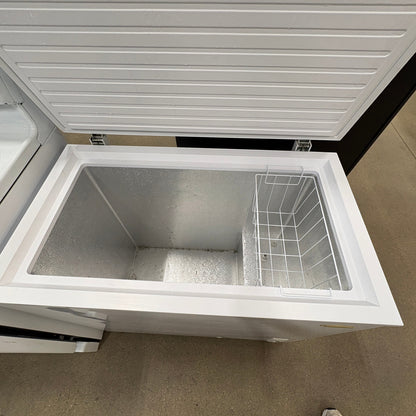 GDM Habitat for Humanity ReStore white chest freezer with open lid and interior storage basket