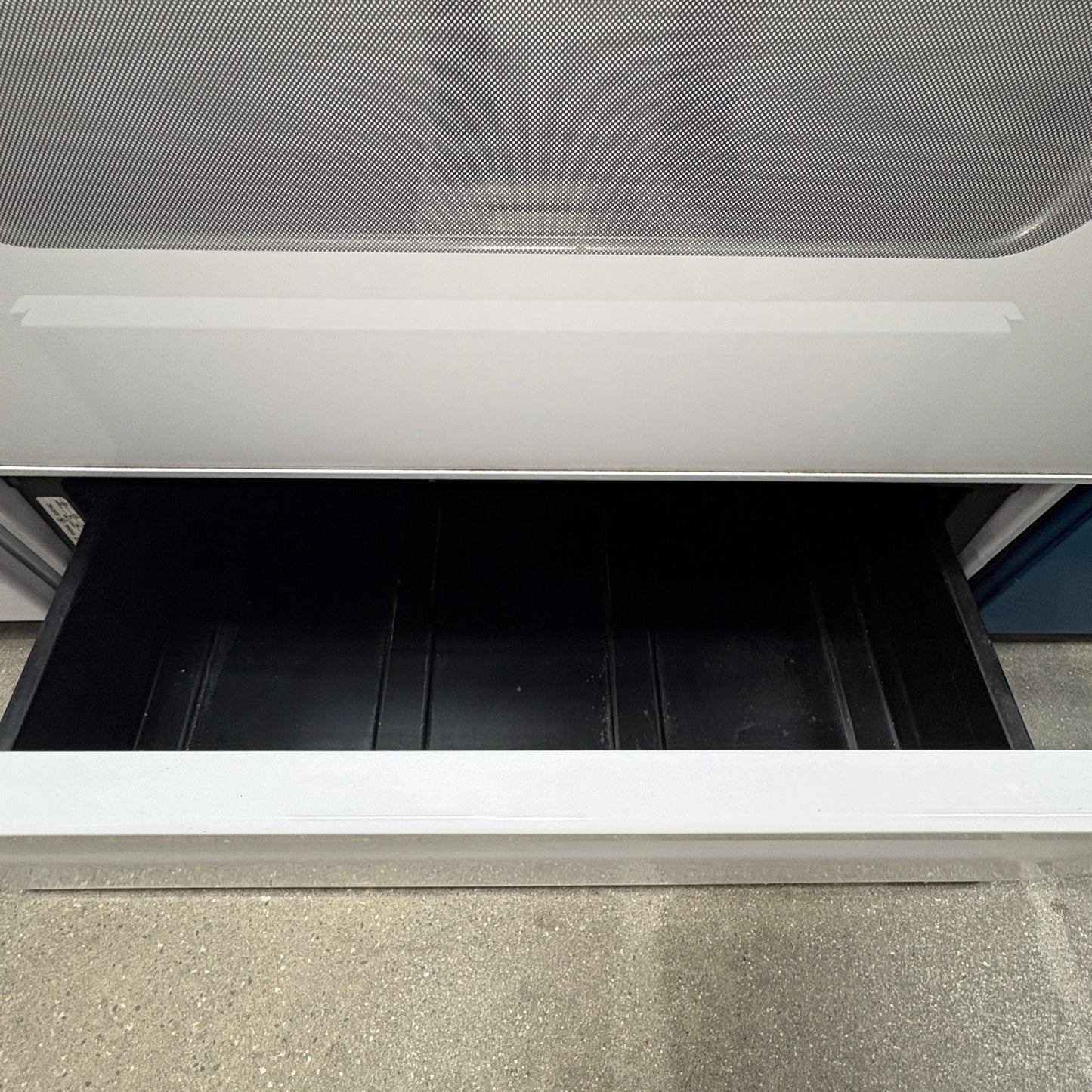 GDM Habitat for Humanity ReStore white GE electric range featuring a pull-out bottom storage drawer