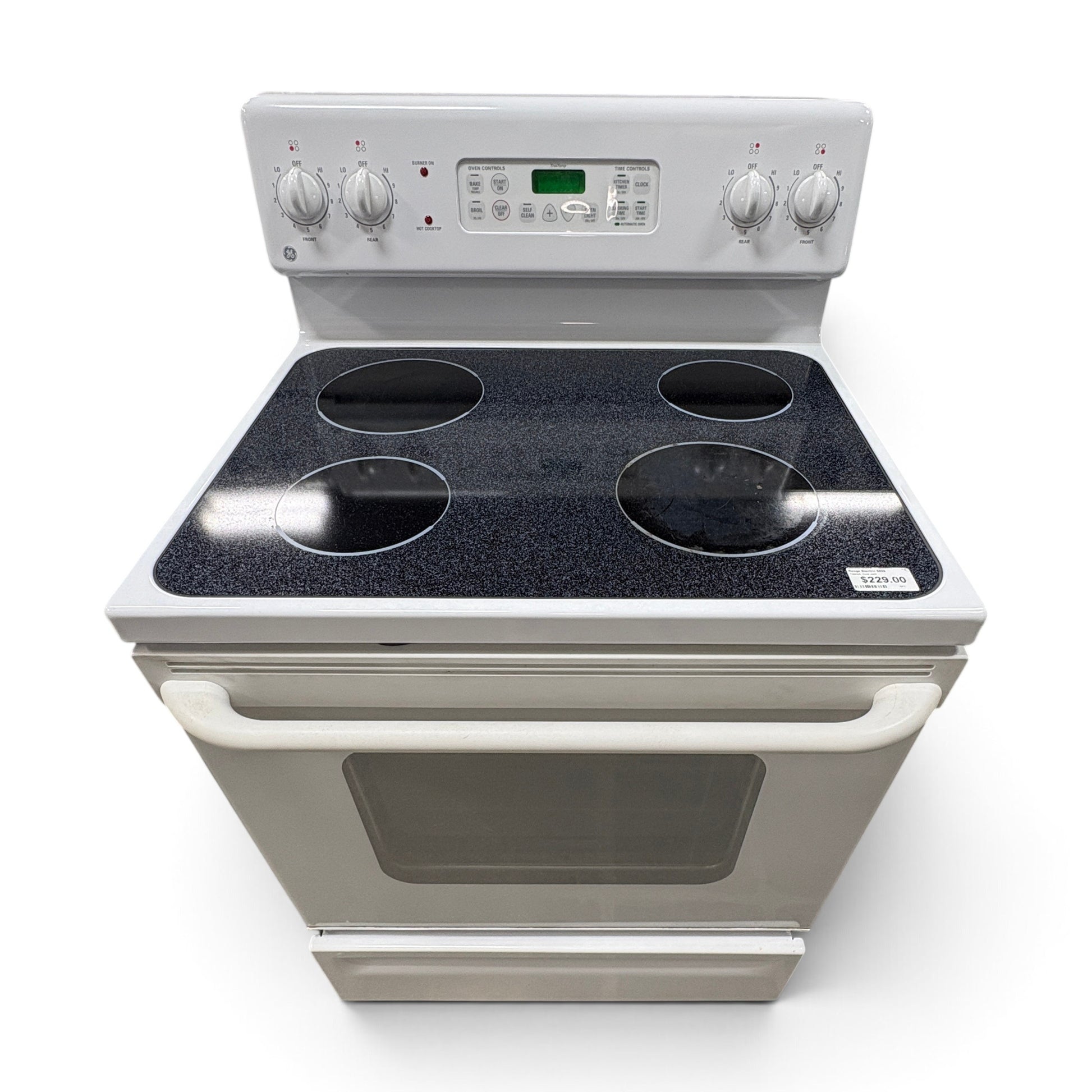 GDM Habitat for Humanity ReStore GE white electric range with a black glass cooktop and digital oven controls.