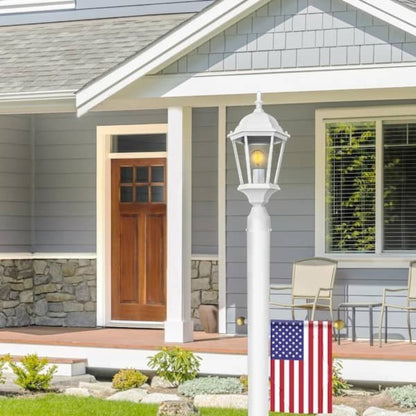 GDM Habitat for Humanity ReStore Oak Creek white outdoor post light installed in a front yard with an American flag