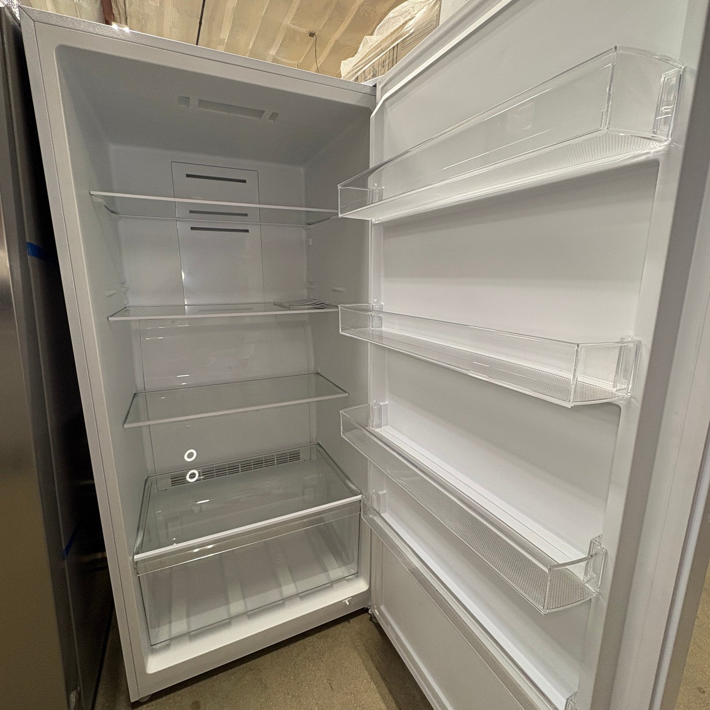 GDM Habitat for Humanity ReStore white refrigerator interior with glass shelves and clear door bins