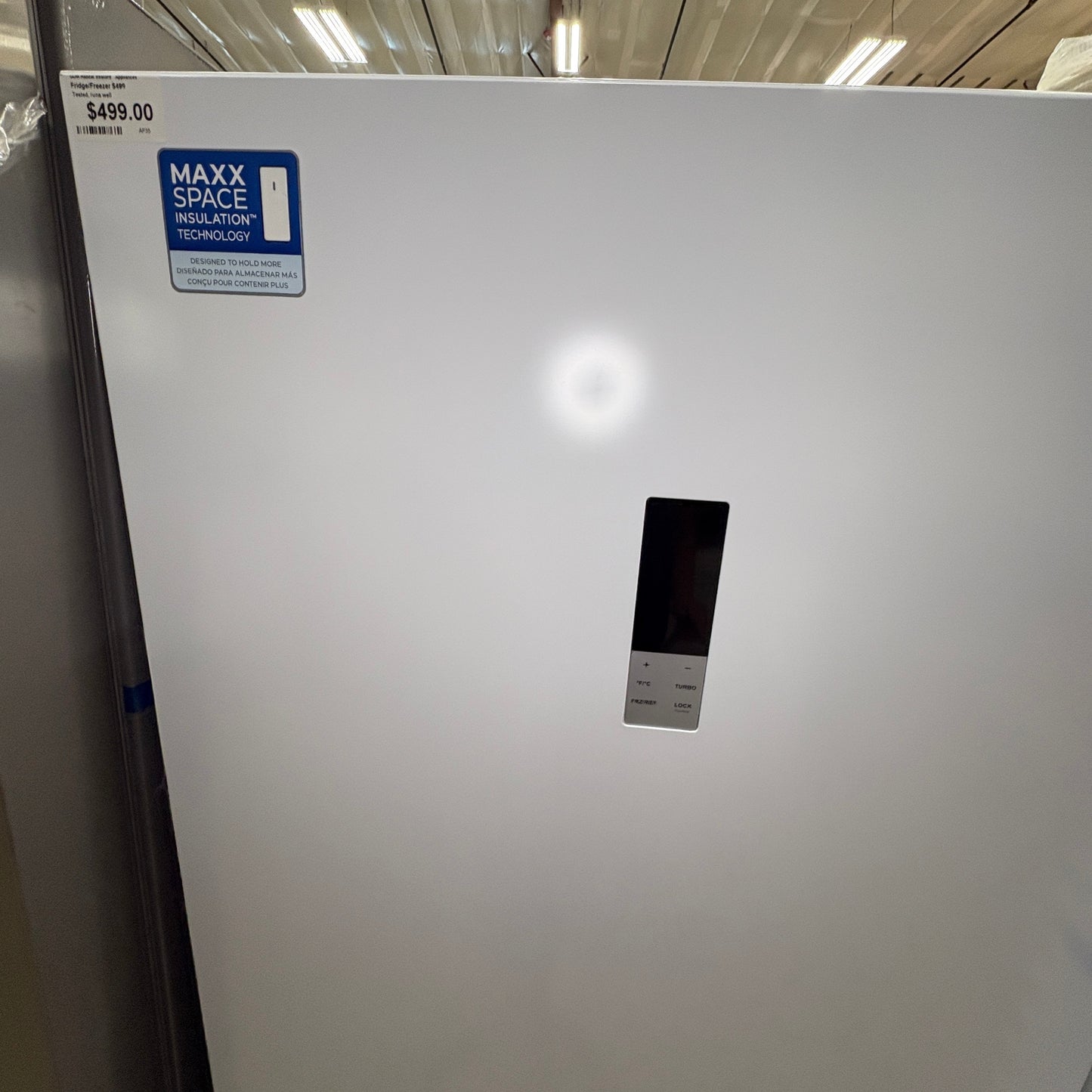 GDM Habitat for Humanity ReStore white upright freezer with digital touch control panel and Maxx Space insulation